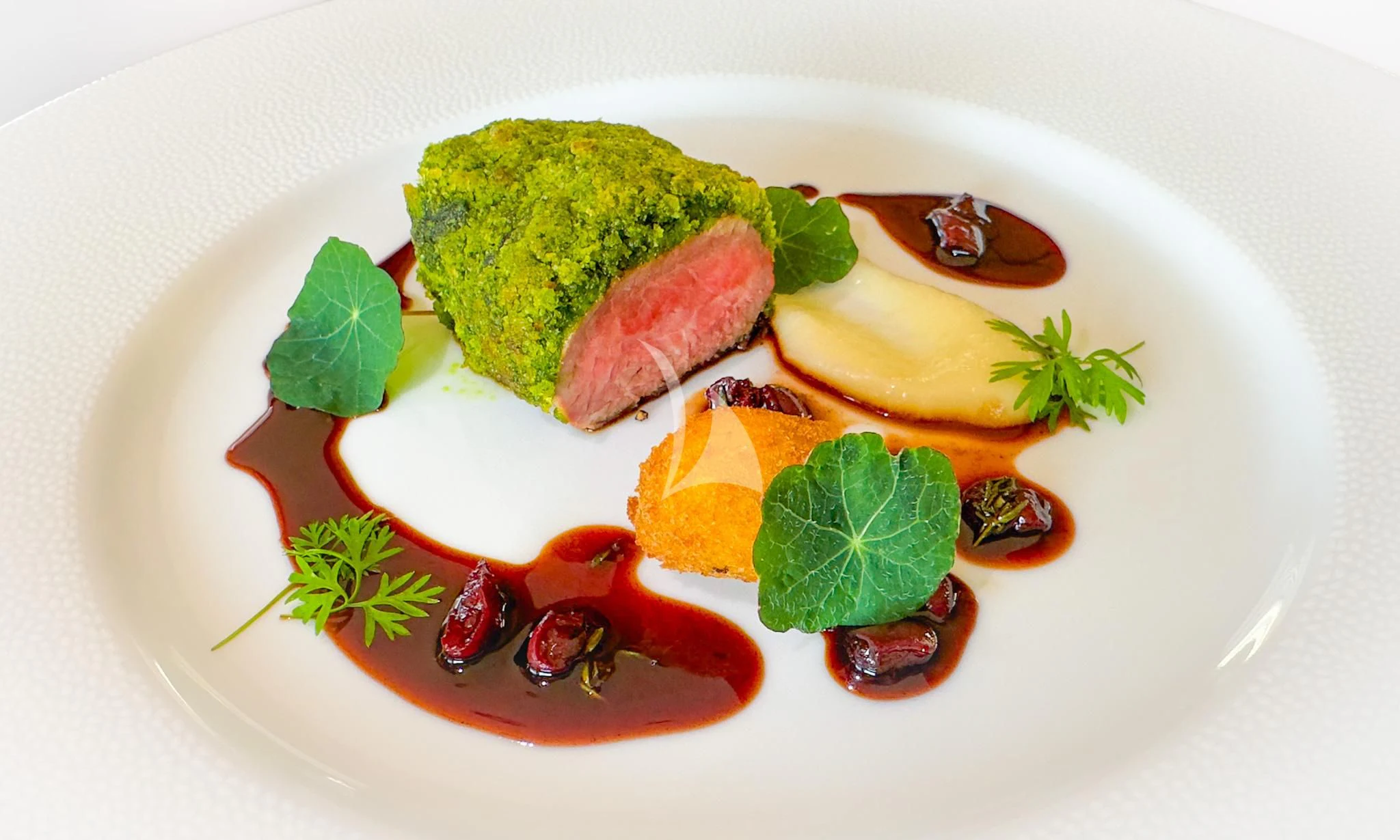 a plate of food aboard WHEELS Yacht for Sale