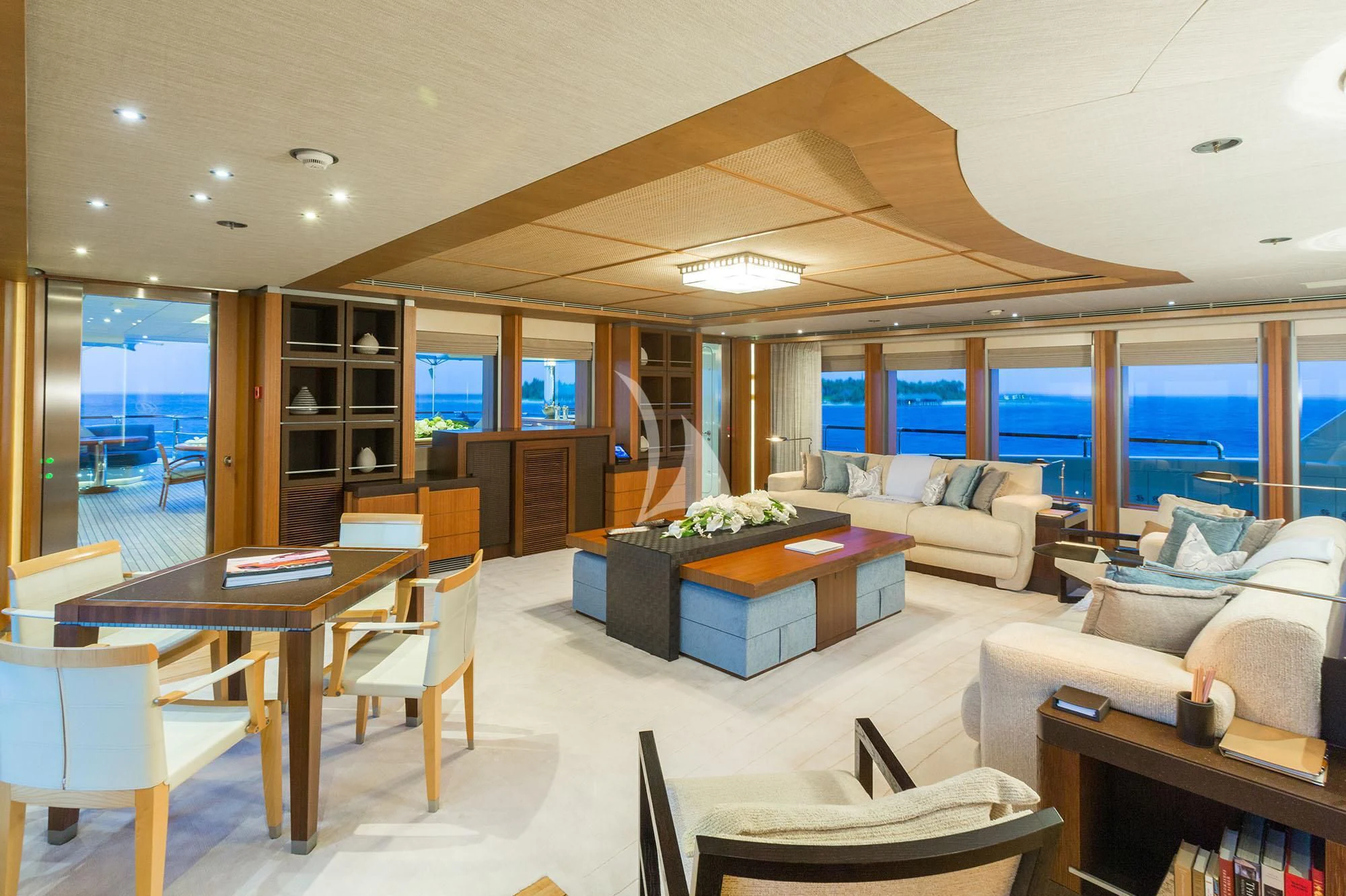 a living room with a large window aboard WHEELS Yacht for Sale
