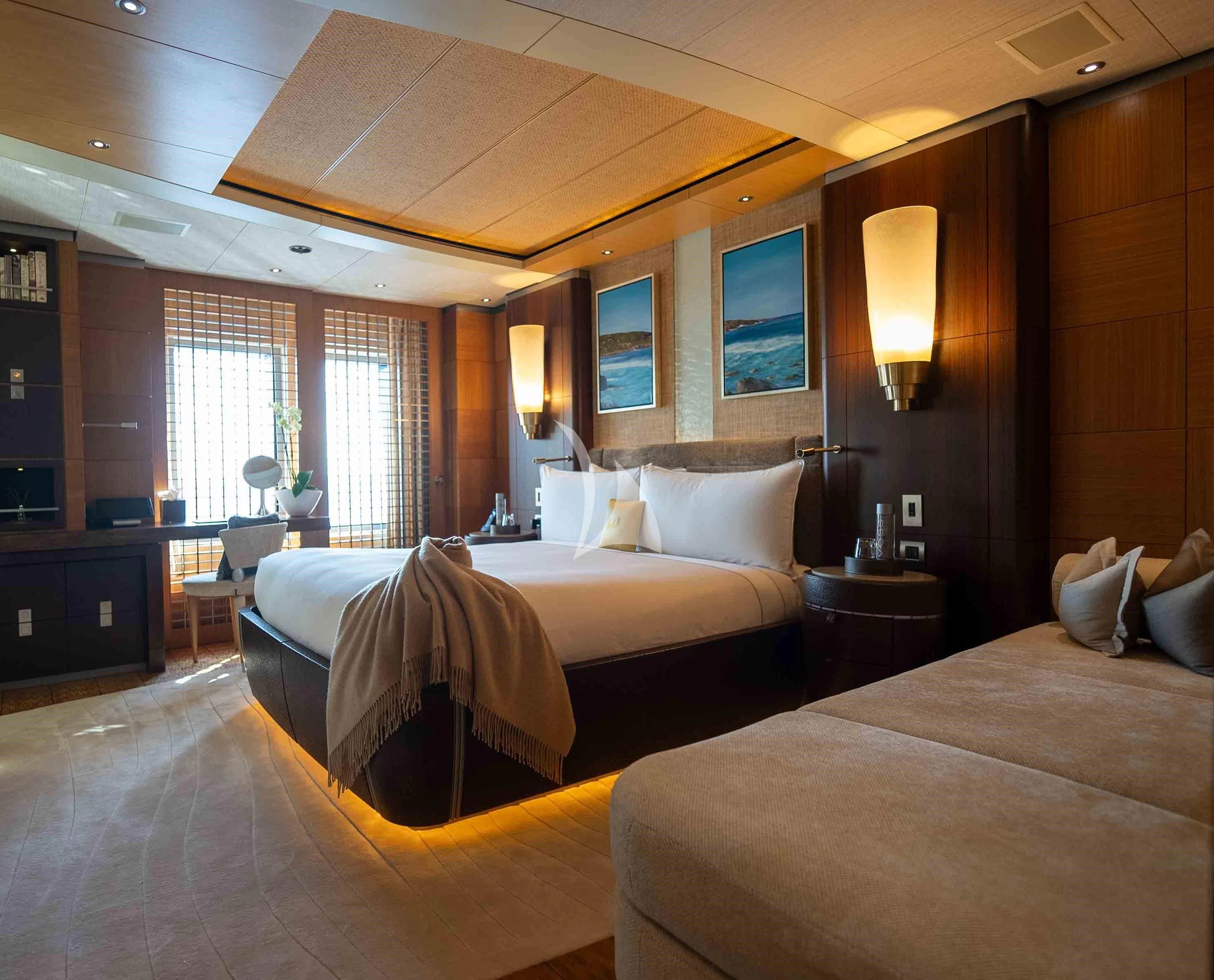 a hotel room with two beds aboard WHEELS Yacht for Sale