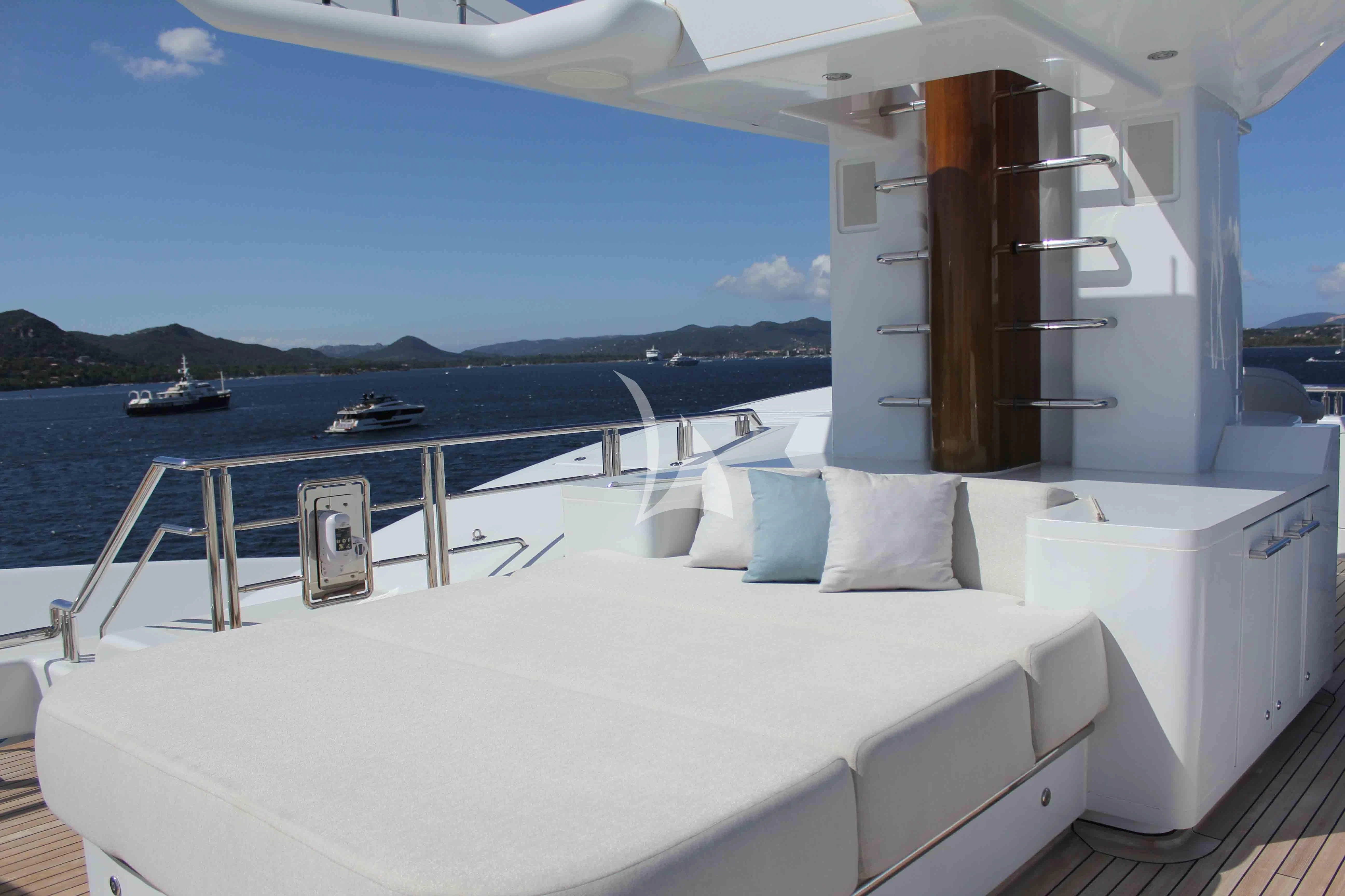 a large white bed on a boat aboard WHEELS Yacht for Sale