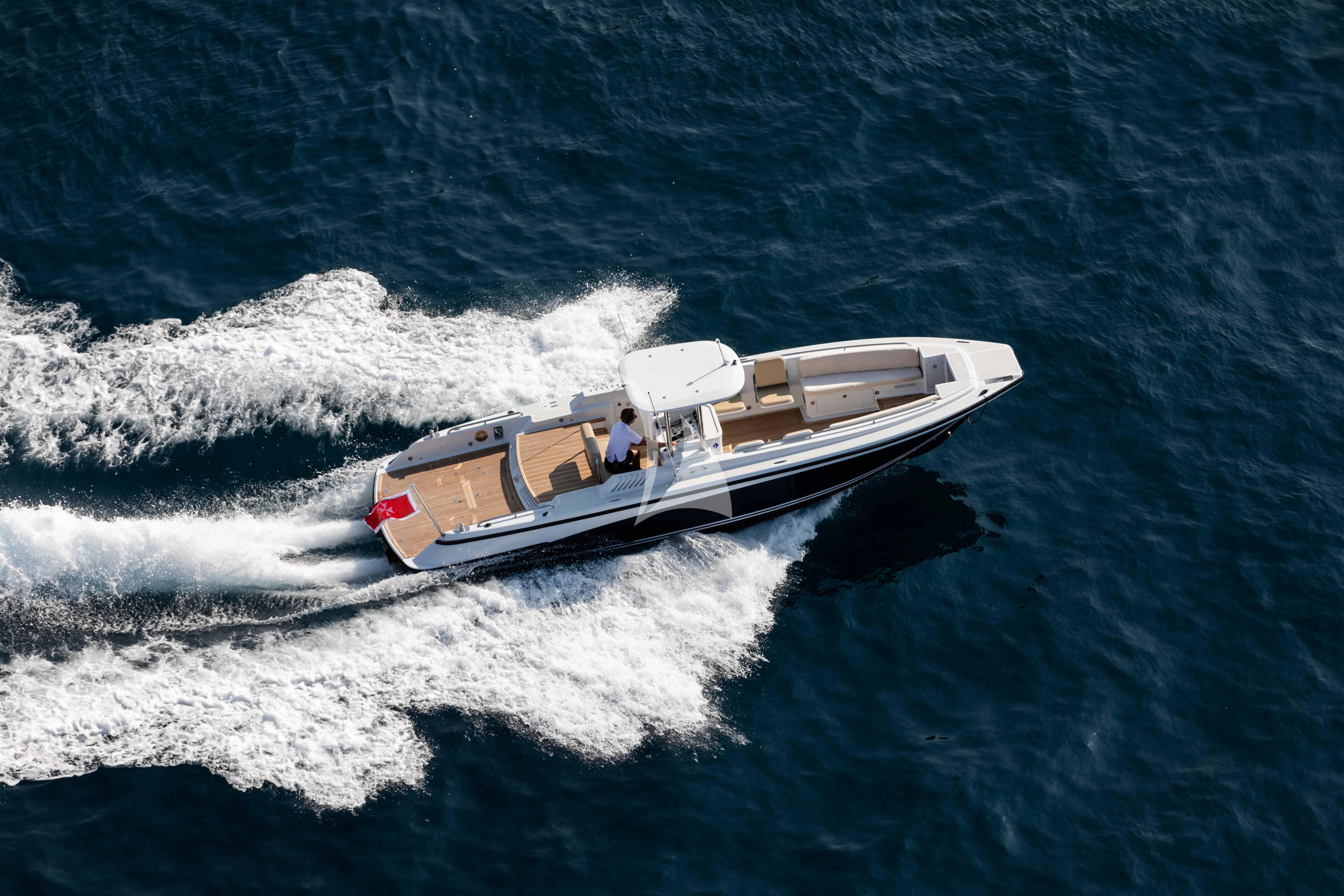 a boat on the water aboard WHEELS Yacht for Sale