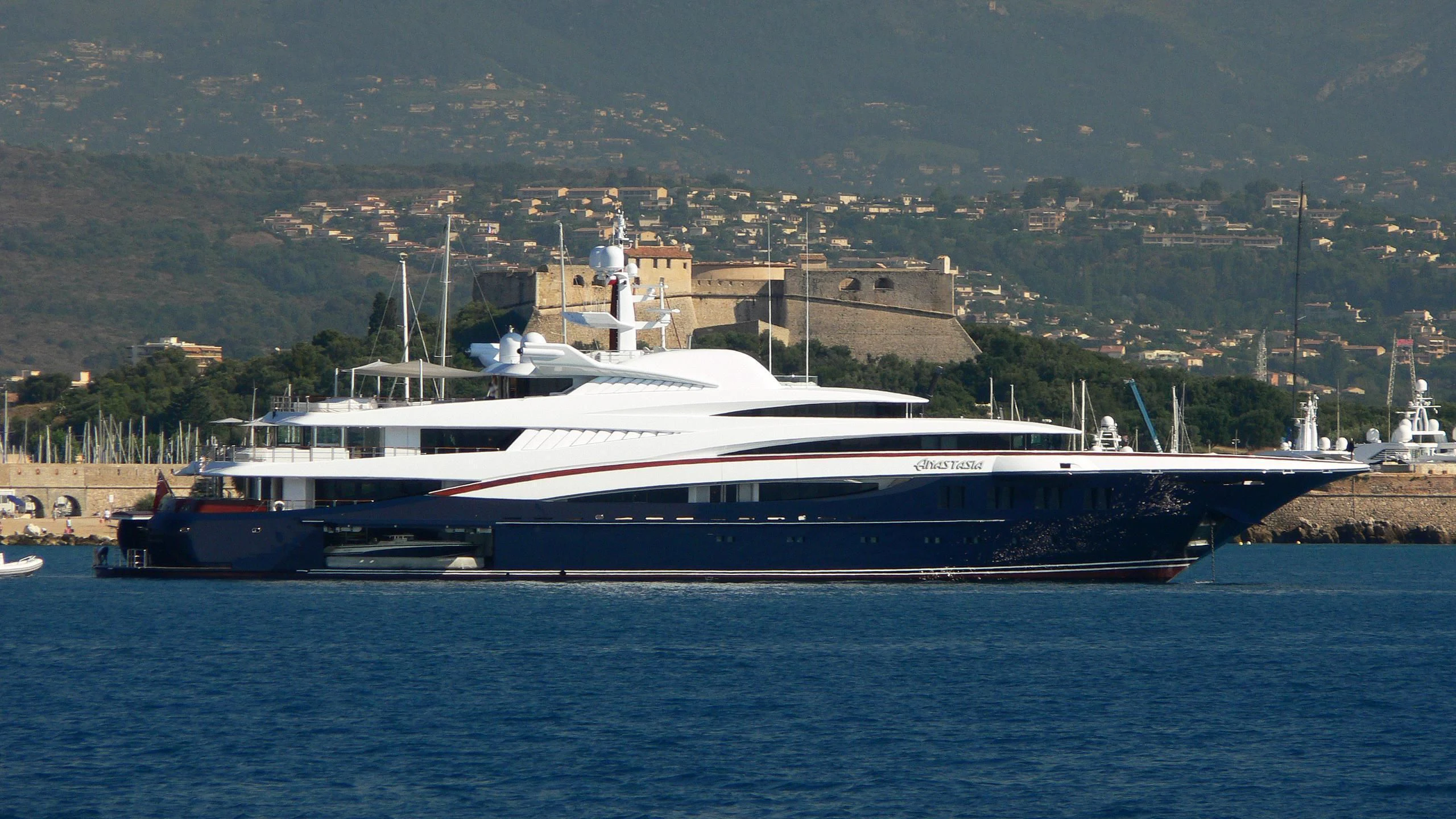 a large boat in the water aboard WHEELS Yacht for Sale