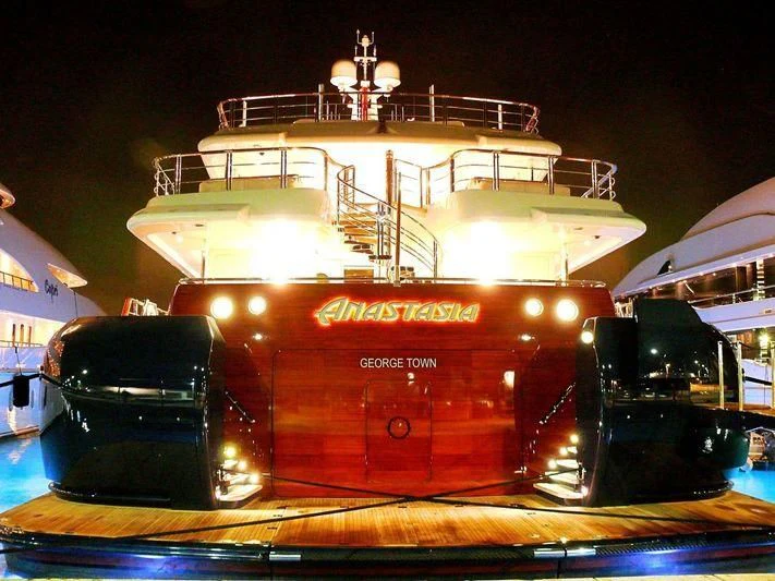 a large boat on a trailer aboard WHEELS Yacht for Sale