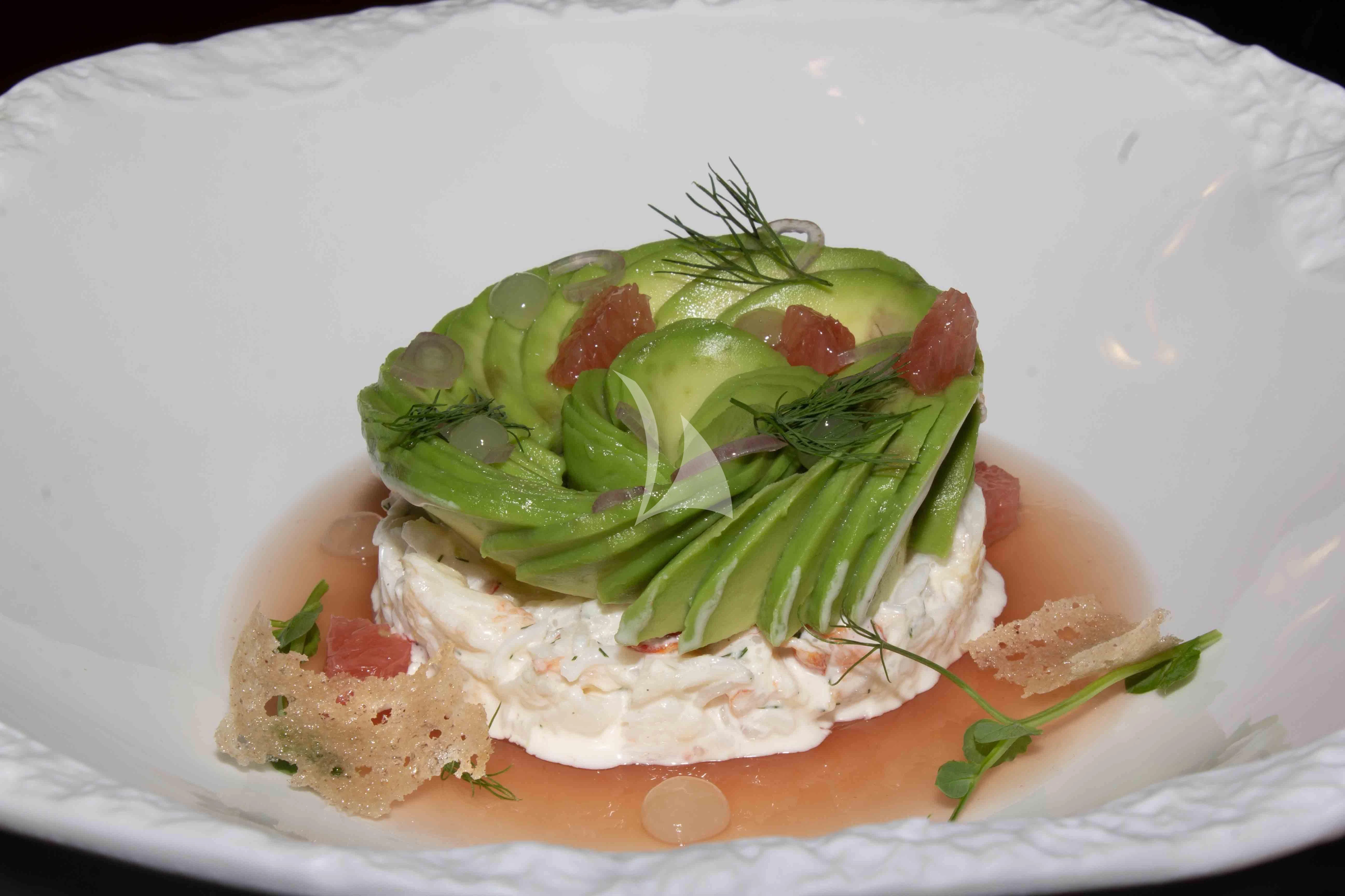 a plate of food aboard WHEELS Yacht for Sale