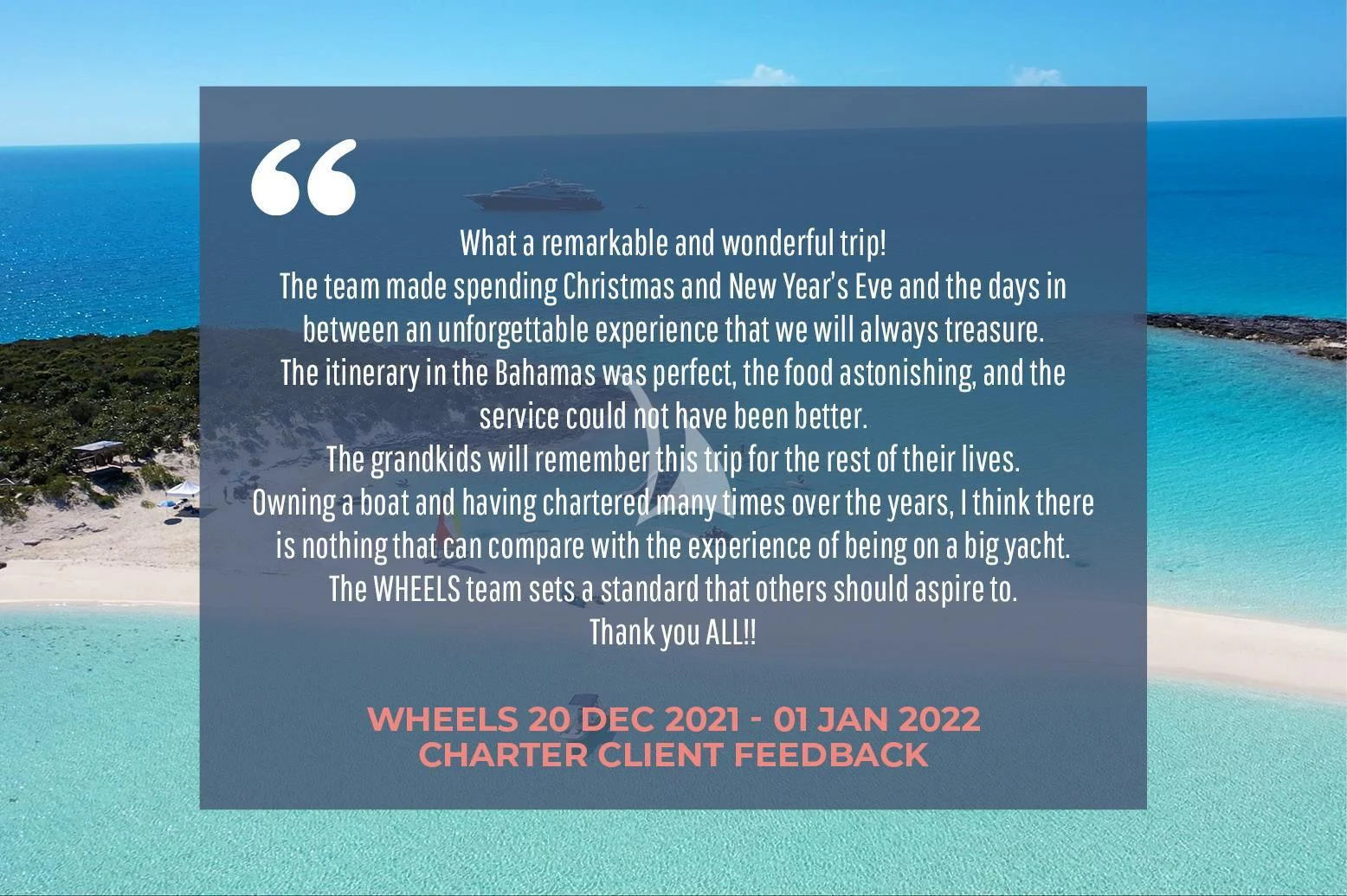 a blue ocean with a sandy beach and blue water aboard WHEELS Yacht for Sale