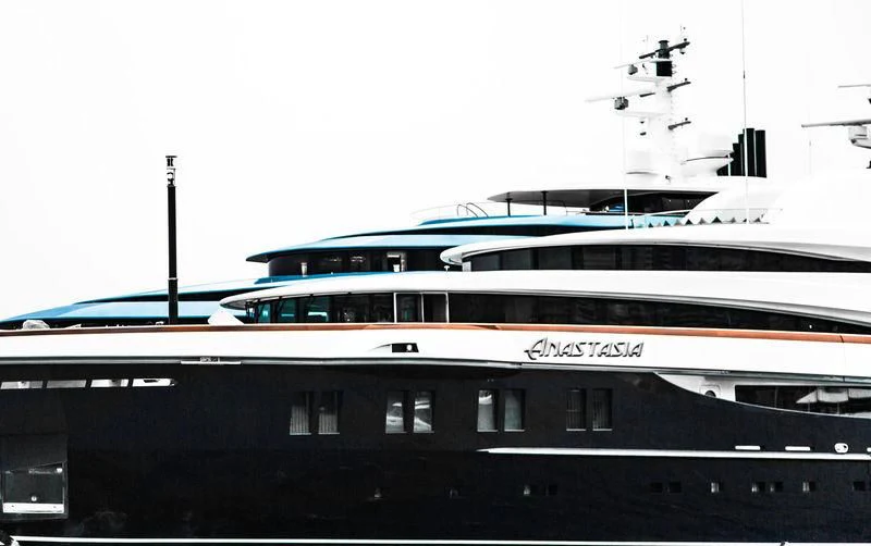 a large ship in the water aboard WHEELS Yacht for Sale
