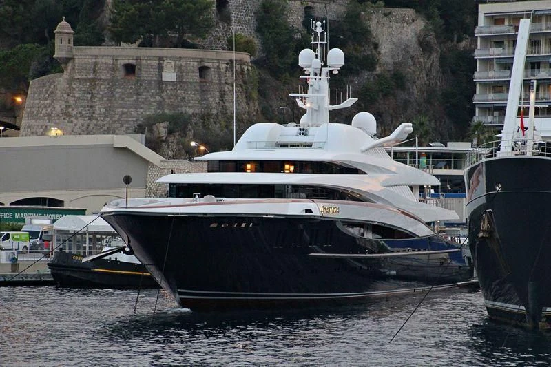 a large white boat sits in the water aboard WHEELS Yacht for Sale