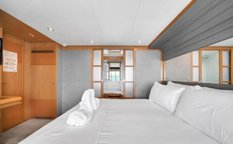 a bed in a room aboard BON BON Yacht for Sale