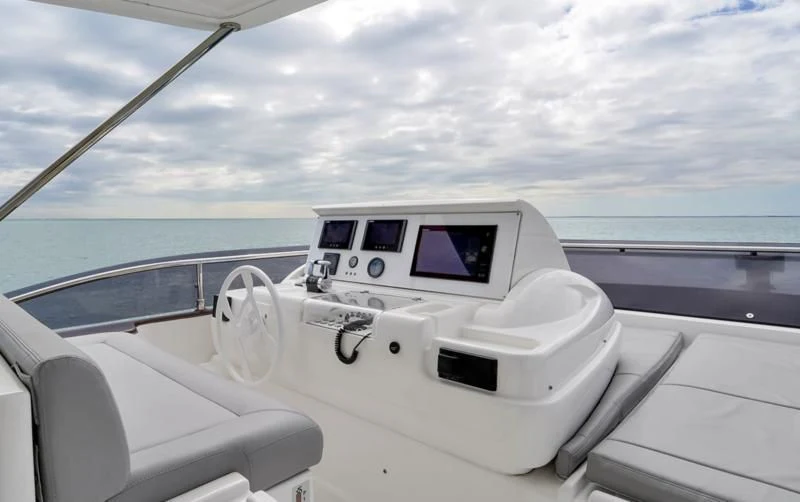 a white car on a boat aboard BON BON Yacht for Sale