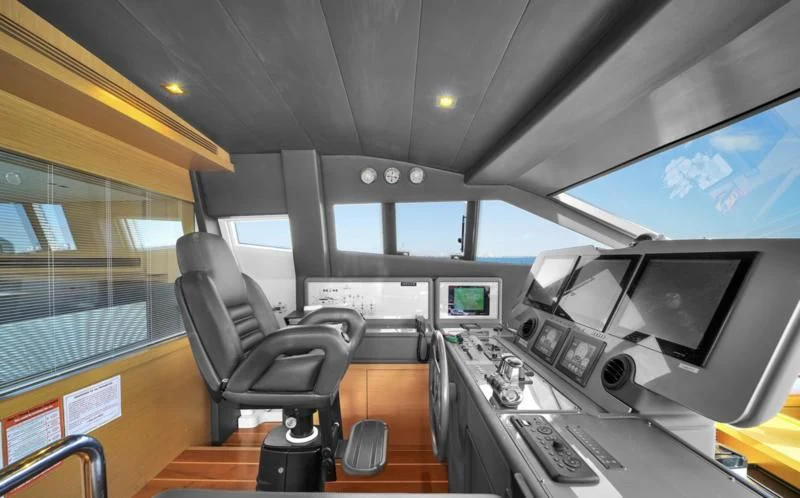an office with computers and monitors aboard BON BON Yacht for Sale