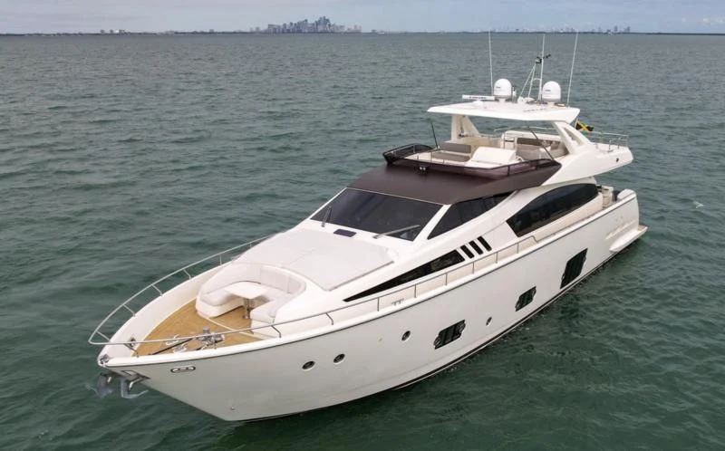 a white boat in the water aboard BON BON Yacht for Sale