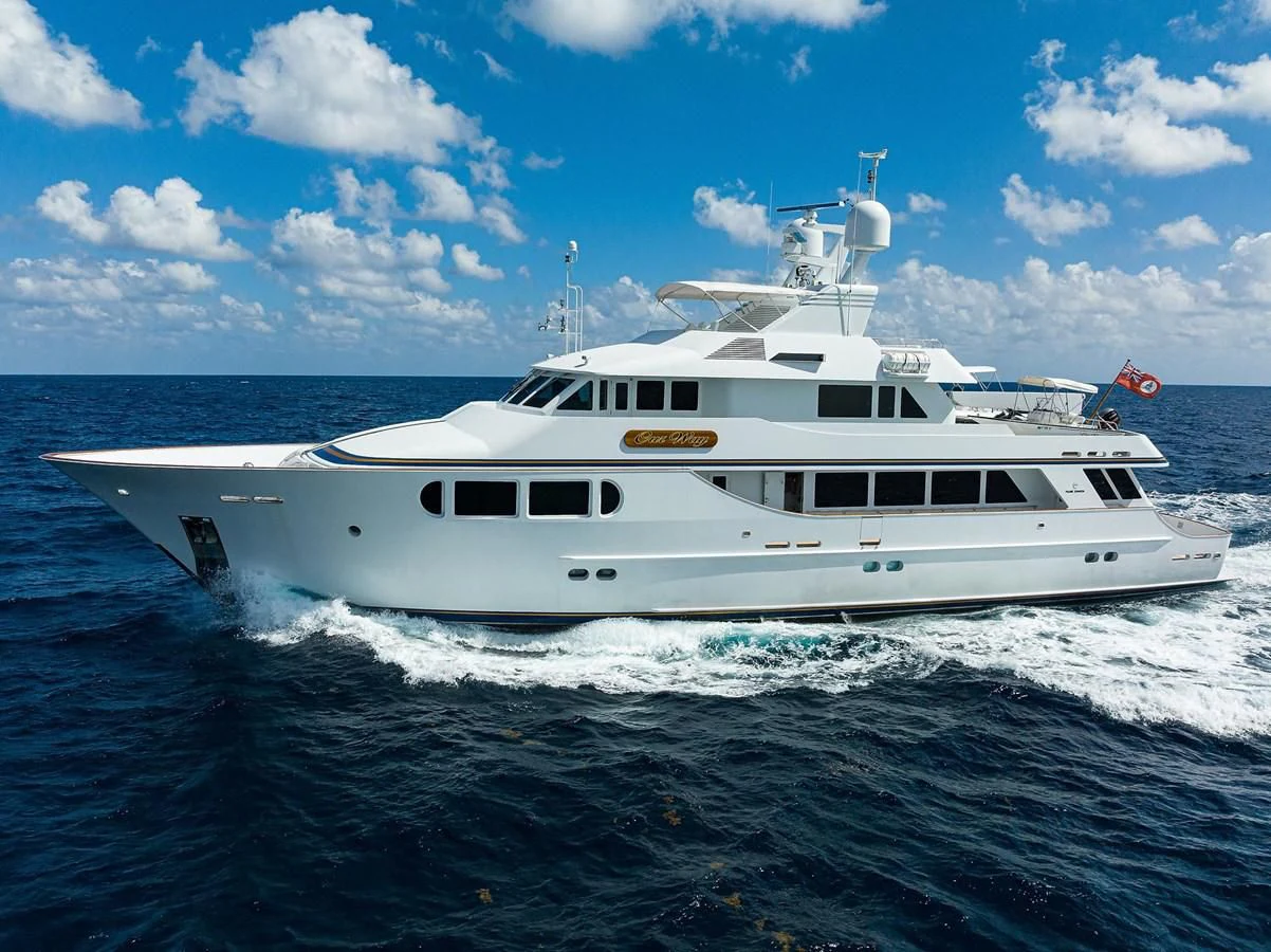 a white yacht in the water aboard OUR WAY Yacht for Sale