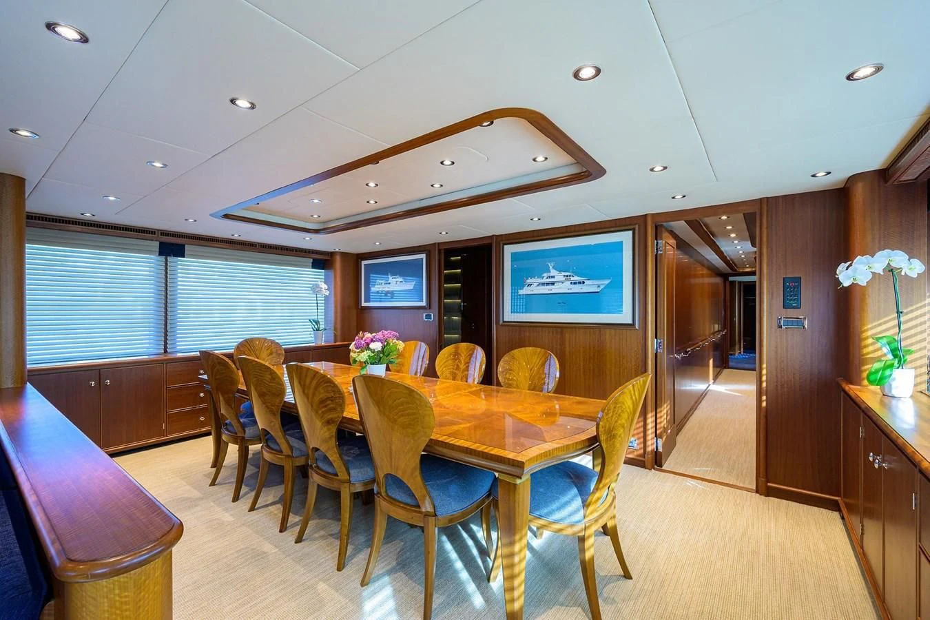 a dining room with a table and chairs aboard OUR WAY Yacht for Sale