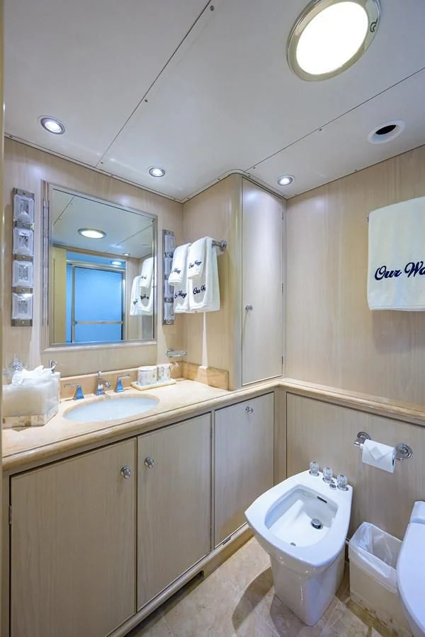 a bathroom with a toilet and sink aboard OUR WAY Yacht for Sale
