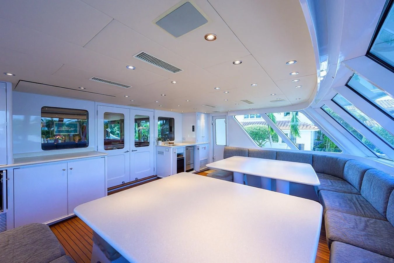 a room with a bed and a table aboard OUR WAY Yacht for Sale