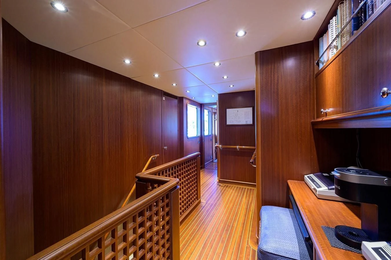 a room with wooden walls and a staircase aboard OUR WAY Yacht for Sale