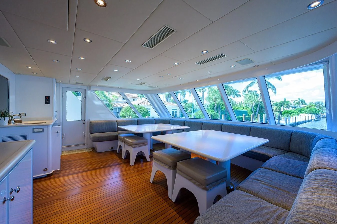 a living room with a couch and a table aboard OUR WAY Yacht for Sale
