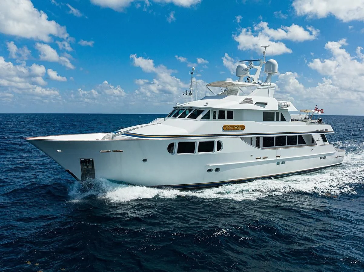 a white yacht in the water aboard OUR WAY Yacht for Sale