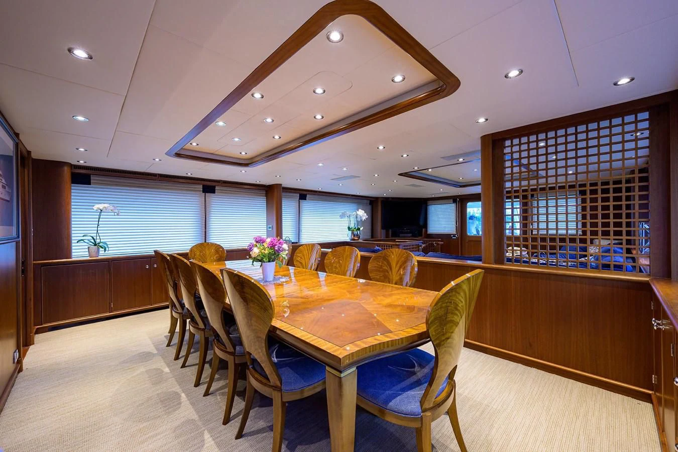 a dining room with a table and chairs aboard OUR WAY Yacht for Sale