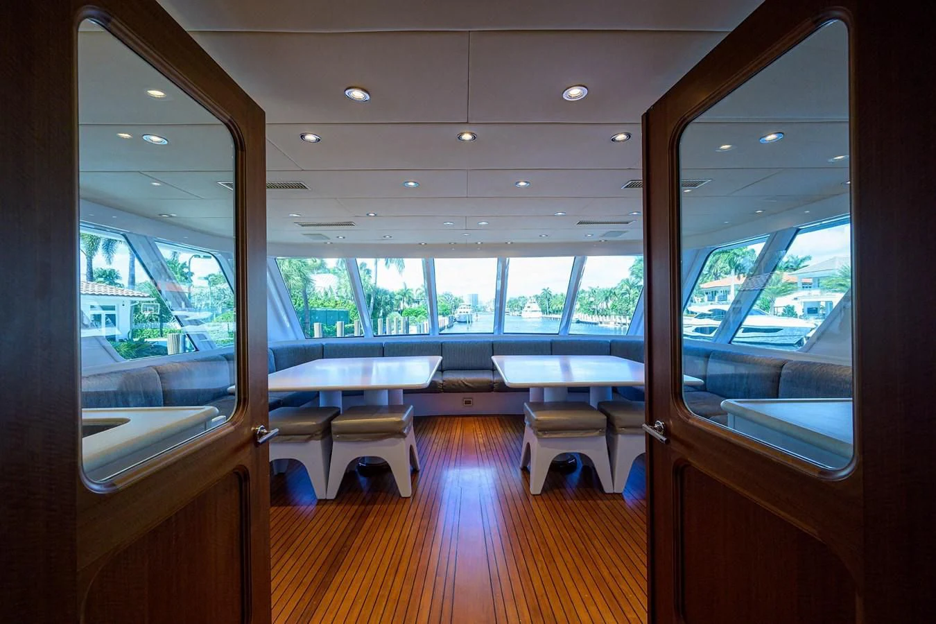 inside of a vehicle with a wood floor and a large window aboard OUR WAY Yacht for Sale