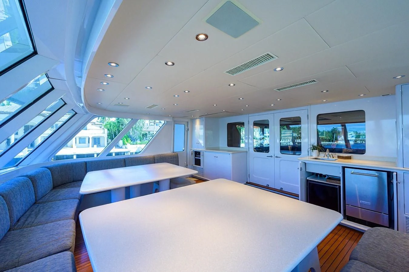 a room with a couch and a table aboard OUR WAY Yacht for Sale