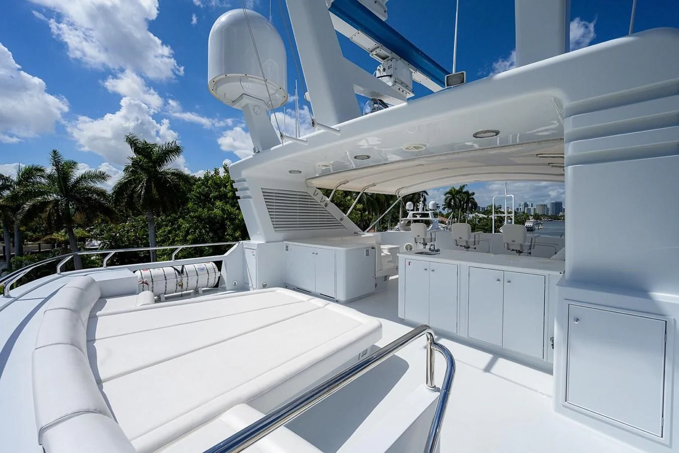 a large white building with a staircase aboard OUR WAY Yacht for Sale