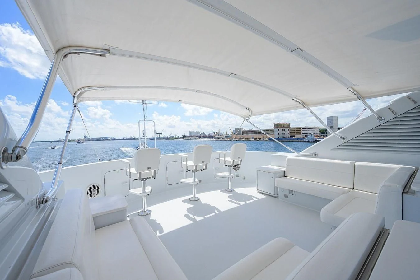 a boat with chairs on it aboard OUR WAY Yacht for Sale