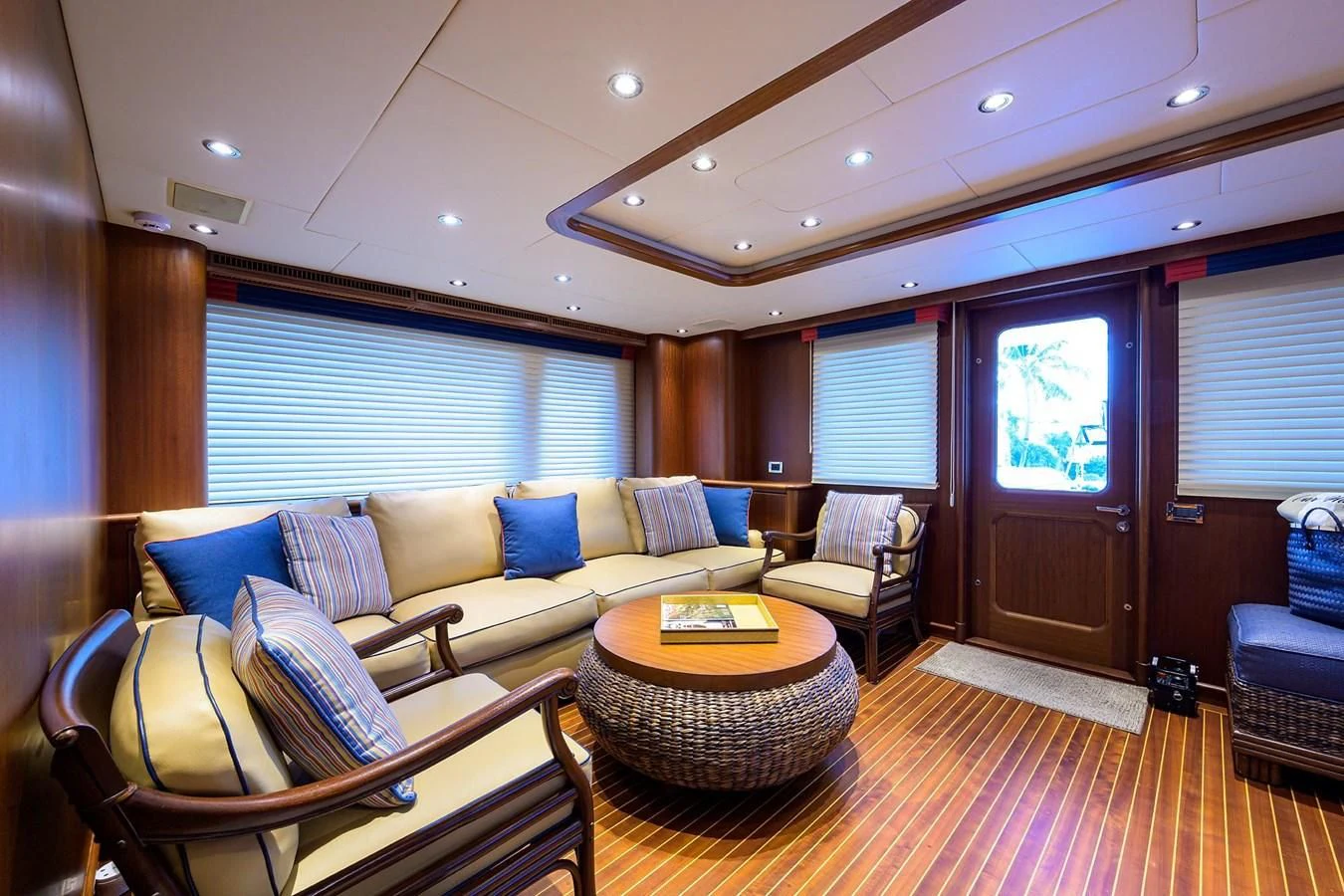 a living room with a couch and a table aboard OUR WAY Yacht for Sale