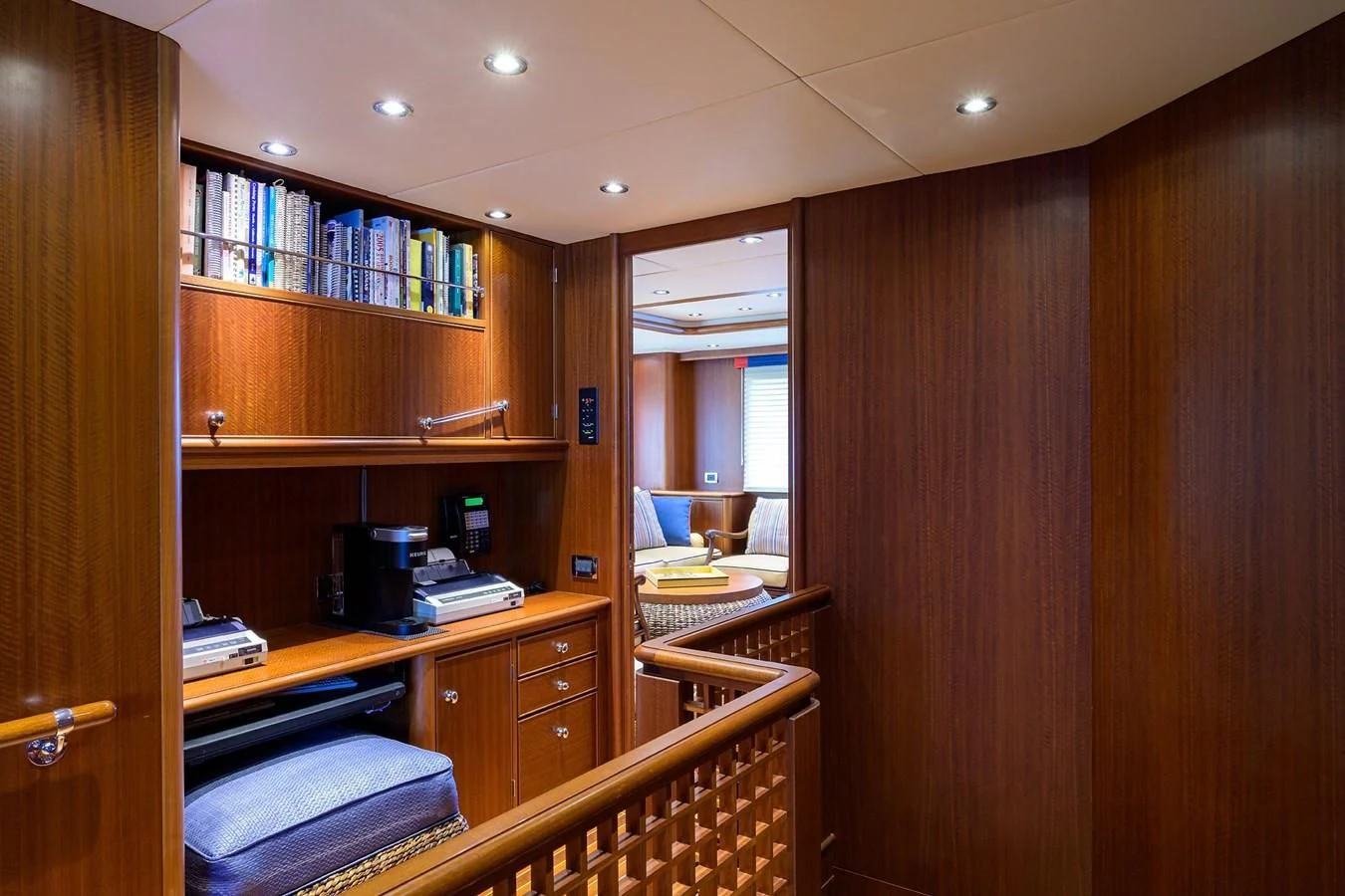 a room with a desk and a window aboard OUR WAY Yacht for Sale