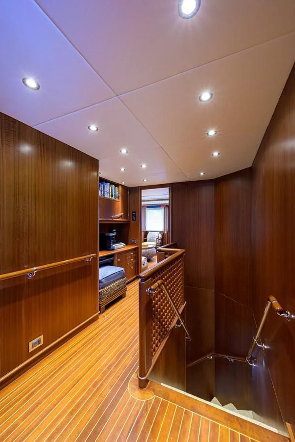 a kitchen with wooden cabinets aboard OUR WAY Yacht for Sale