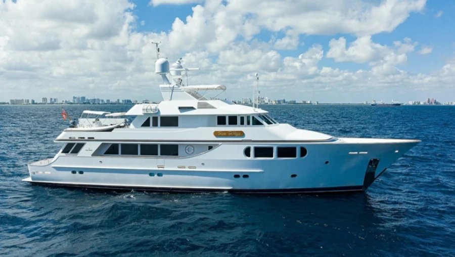 a white yacht in the water aboard OUR WAY Yacht for Sale