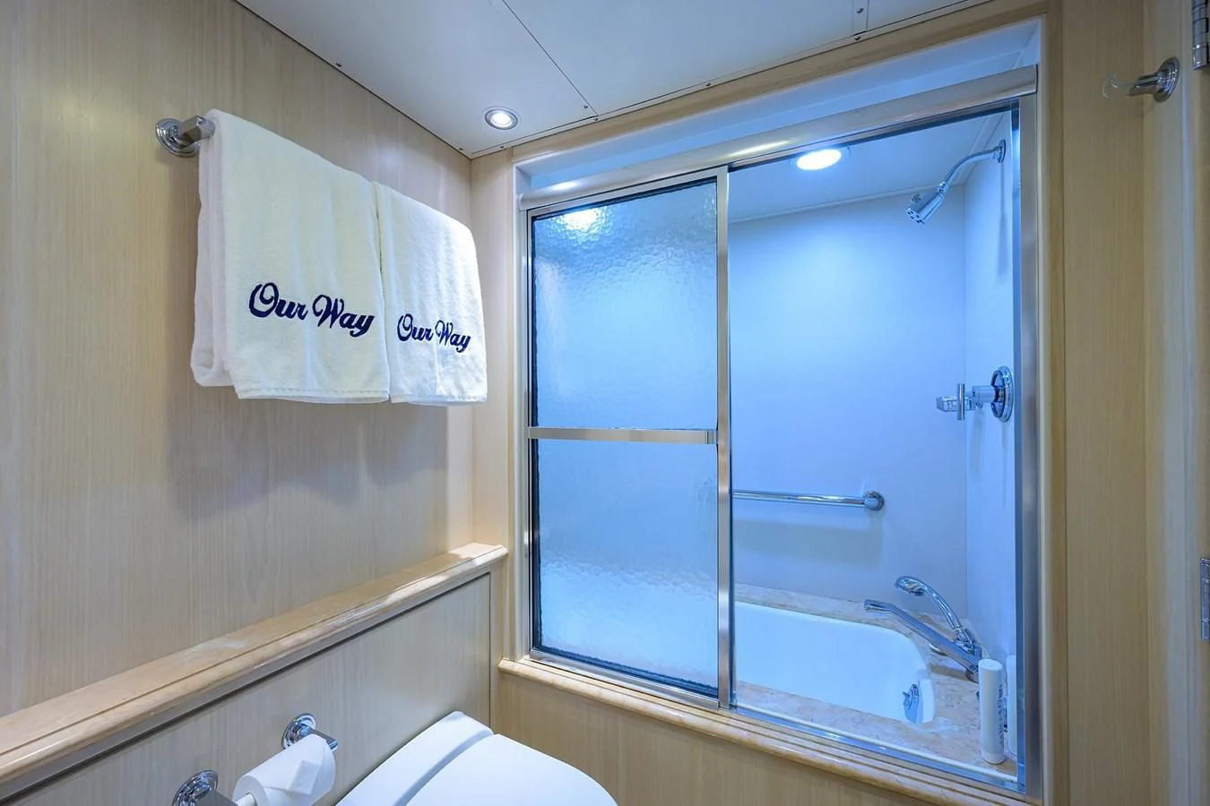 a bathroom with a window and a bathtub aboard OUR WAY Yacht for Sale