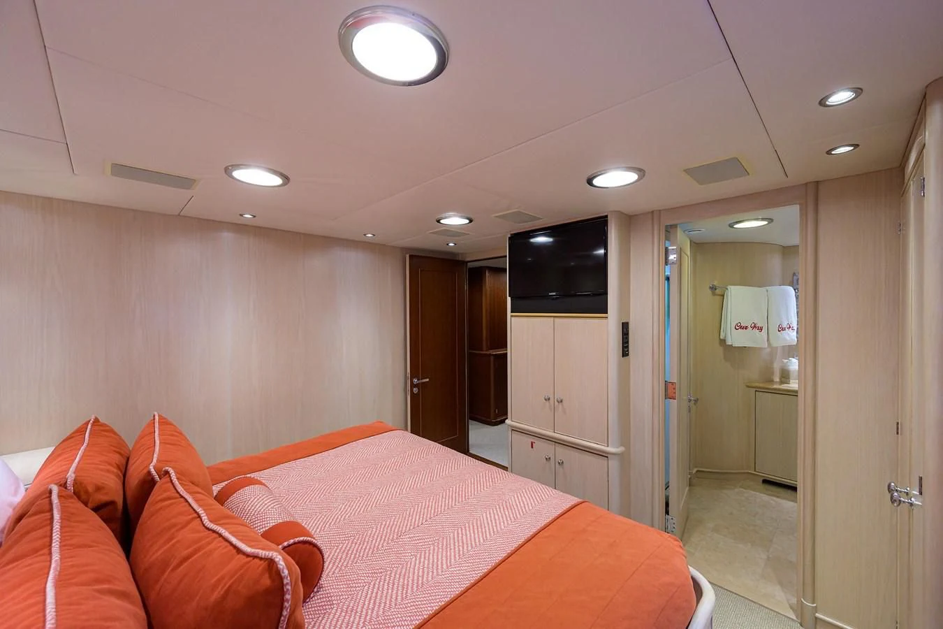 a bedroom with a bed and a television aboard OUR WAY Yacht for Sale