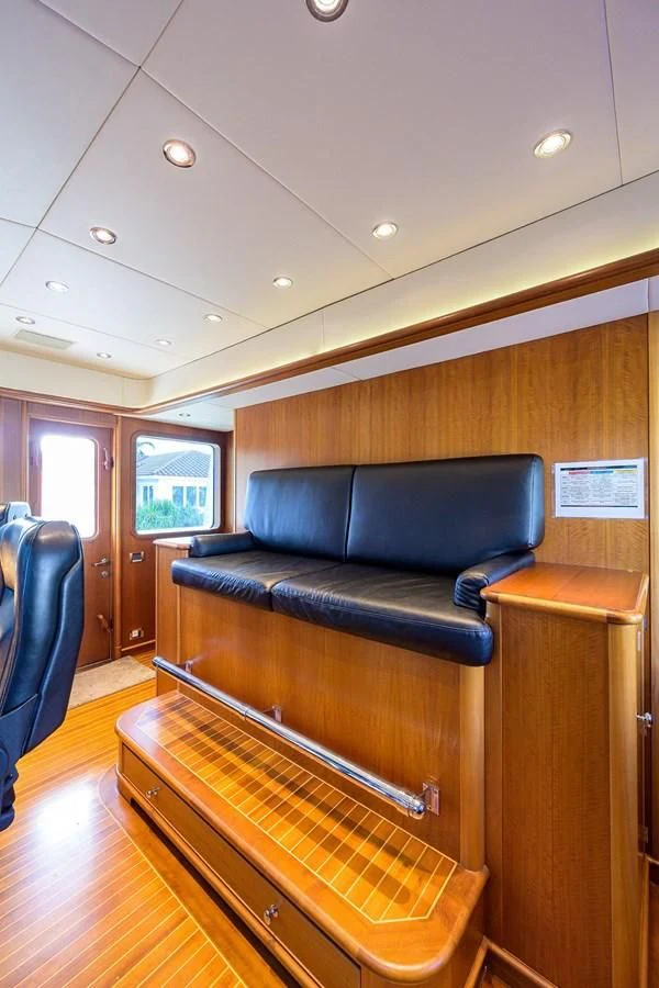 a leather couch in a room aboard OUR WAY Yacht for Sale
