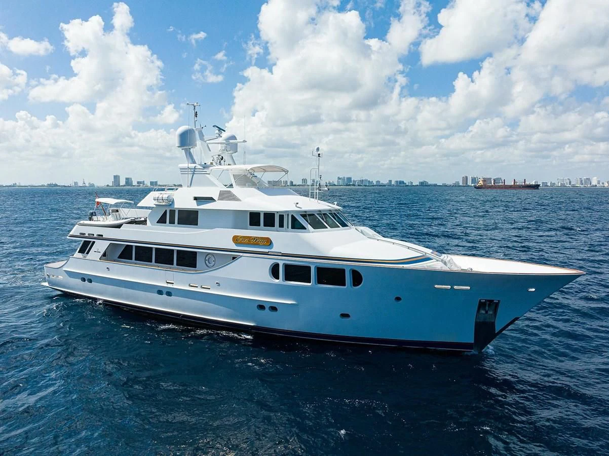 a white yacht in the water aboard OUR WAY Yacht for Sale