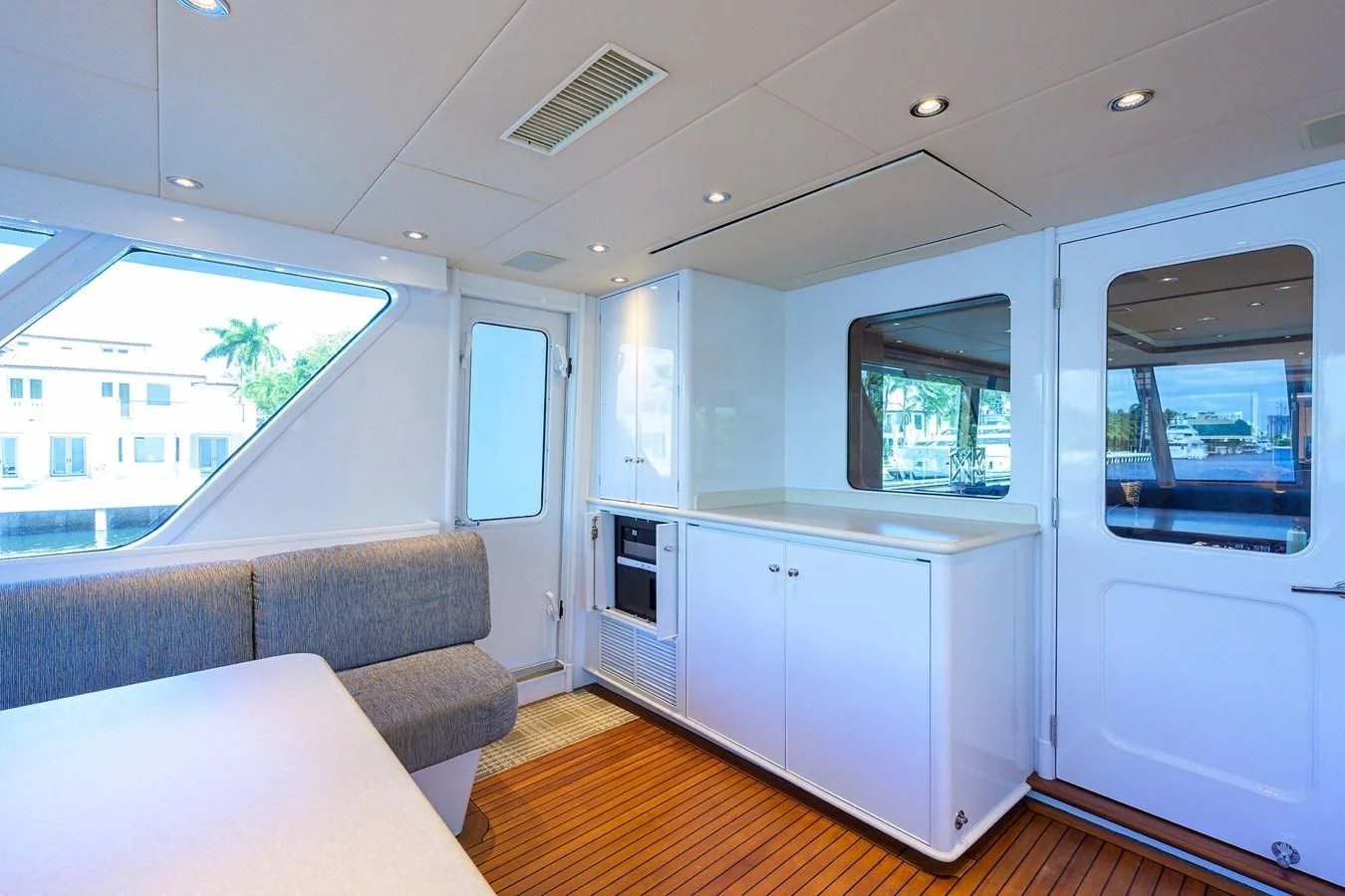 a living room with a couch and a television aboard OUR WAY Yacht for Sale