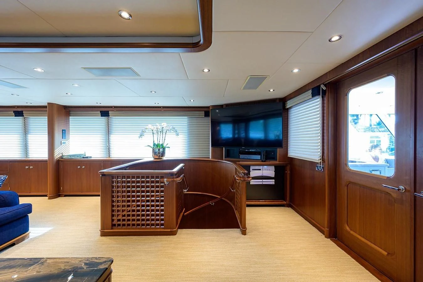 a room with a bench and a chair aboard OUR WAY Yacht for Sale