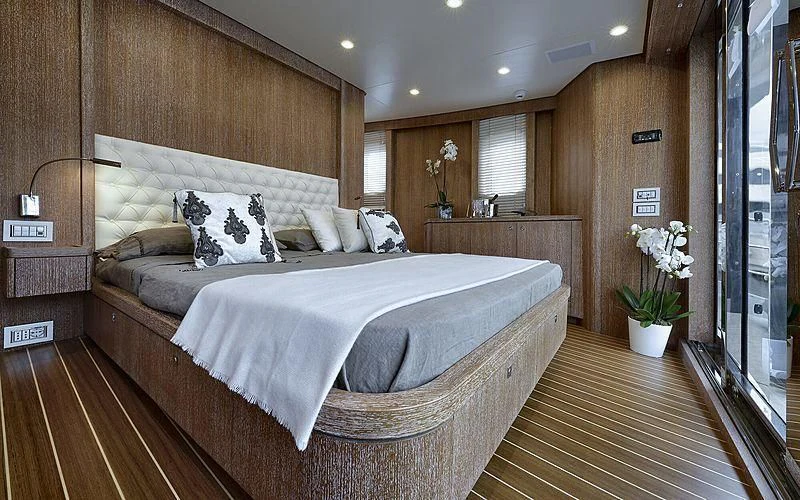 a large bed in a room aboard BULLY Yacht for Sale