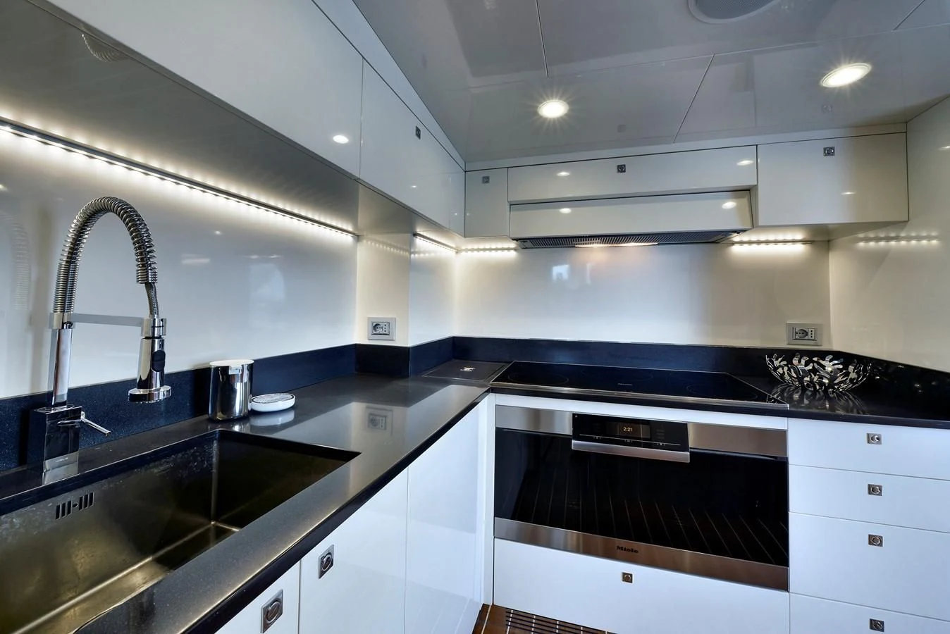 a kitchen with a stainless steel sink aboard BULLY Yacht for Sale