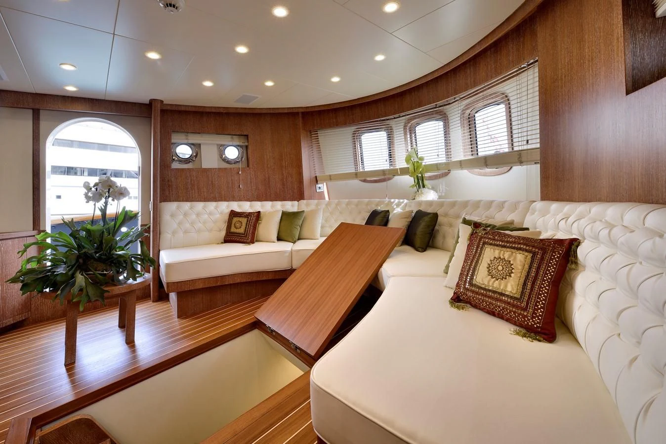 a room with a couch and a table aboard BULLY Yacht for Sale