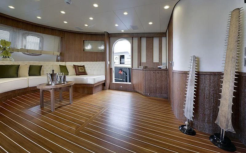a large living room with a wood floor and a wood floor aboard BULLY Yacht for Sale