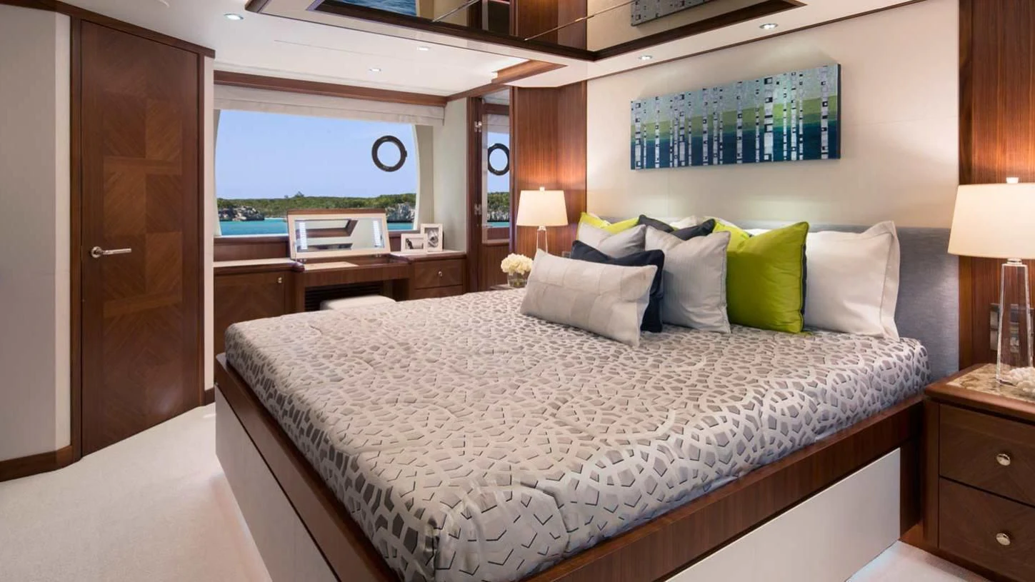 a large bed in a hotel room aboard OCEAN ROSE Yacht for Sale