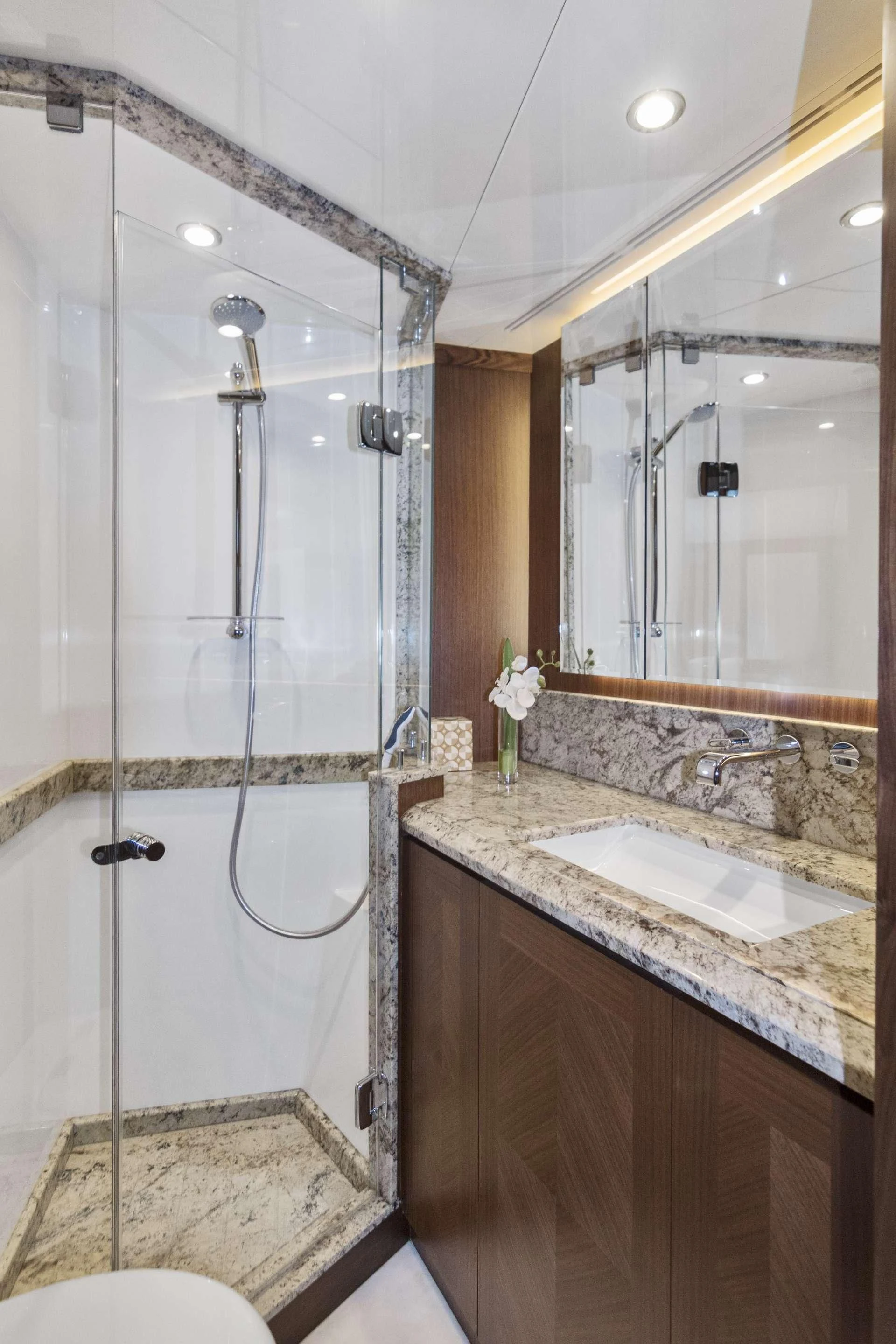 a bathroom with a shower unit and sink aboard OCEAN ROSE Yacht for Sale