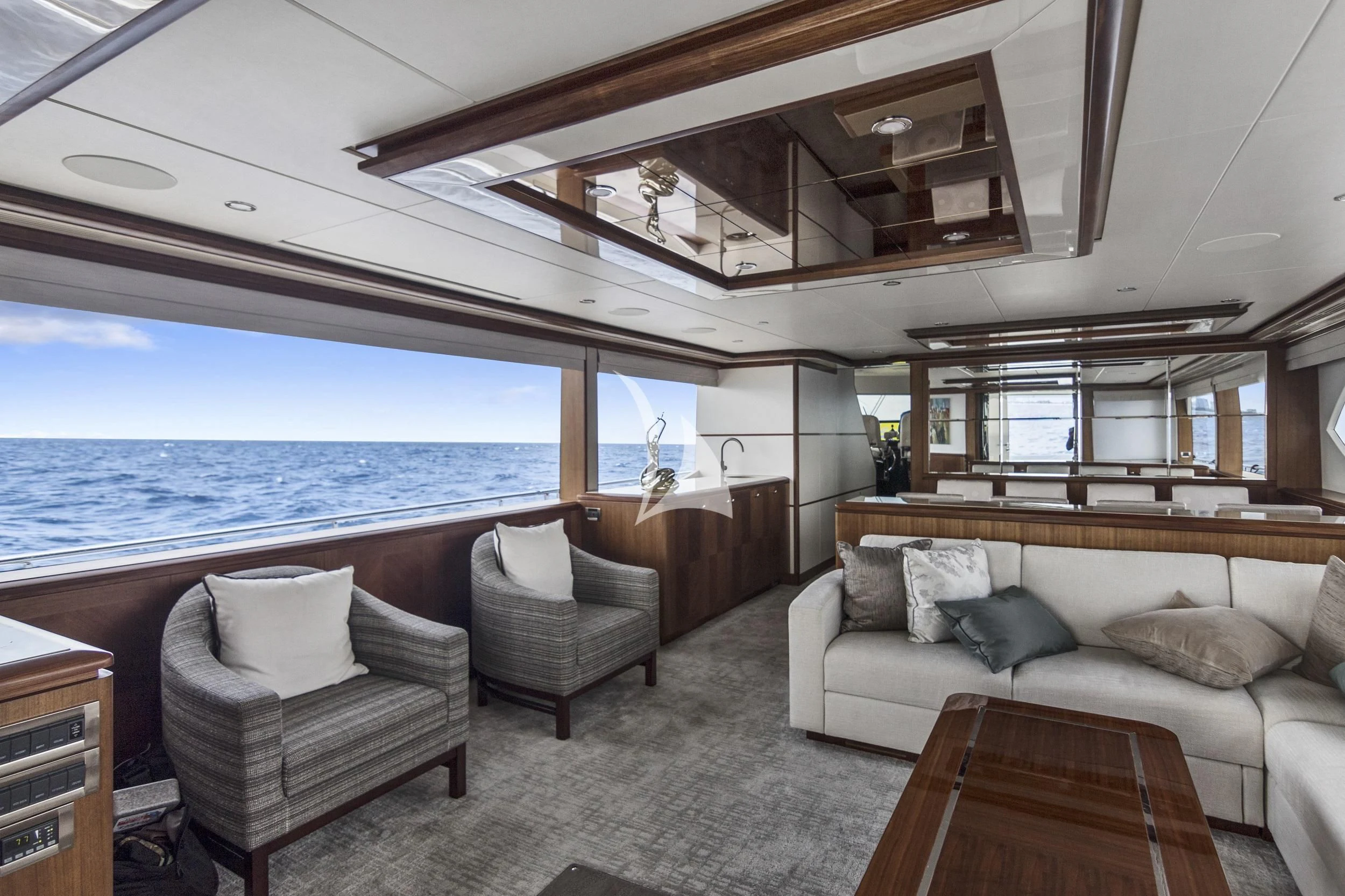 a large living room with a large ocean view aboard OCEAN ROSE Yacht for Sale