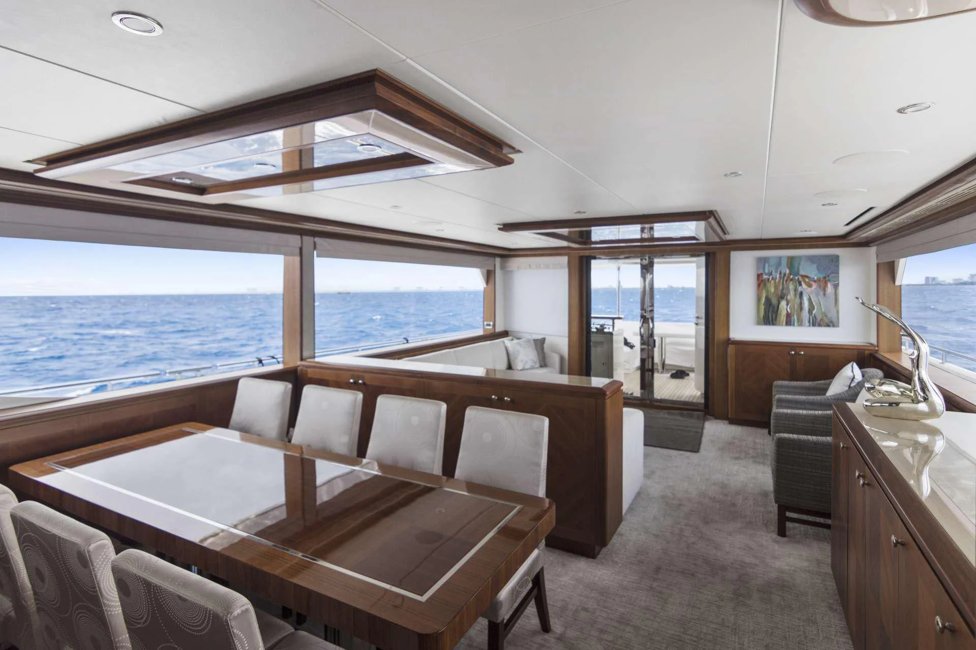 a large room with a bed and a large window aboard OCEAN ROSE Yacht for Sale