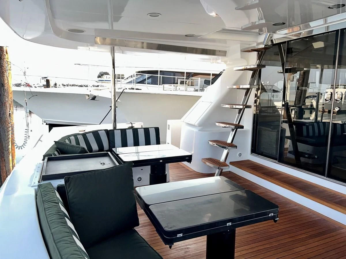 a room with a couch and a table aboard OREGON MIST Yacht for Sale