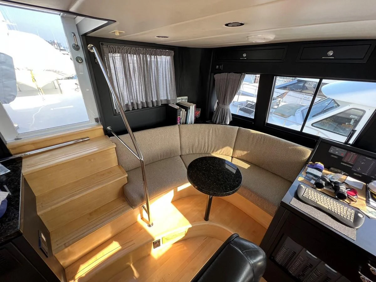 a room with a desk and a computer aboard OREGON MIST Yacht for Sale