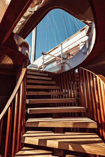 a staircase with a railing aboard ARTEXPLORER Yacht for Sale