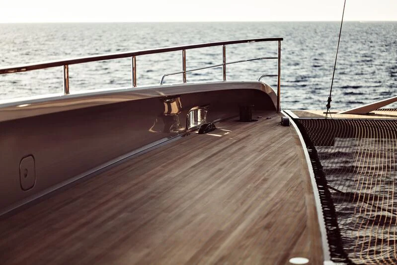 a deck with a railing and a railing overlooking a body of water aboard ARTEXPLORER Yacht for Sale