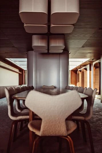 a chair and a table in a room aboard ARTEXPLORER Yacht for Sale